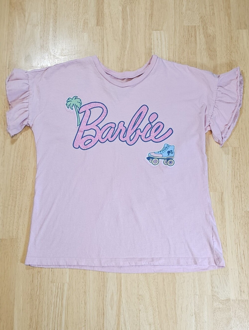 Barbie T-Shirt with Roller Skate and Palm Tree Graphic